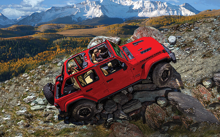 Jeep Wrangler showing great articulation over some difficult terrain